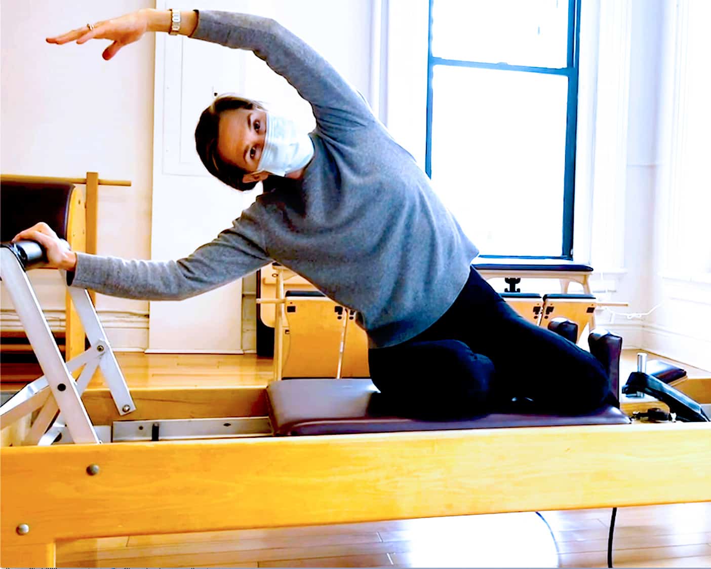 Charlotte performs Mermaid on the Reformer