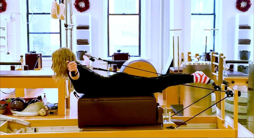 exercise performed is Breast Stroke on the Reformer